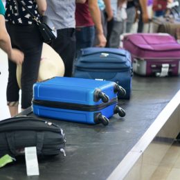 Passengers waiting at baggage claim