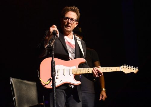 Michael J. Fox playing guitar at A Funny Thing Happened on the Way to Cure Parkinson's gala 2021