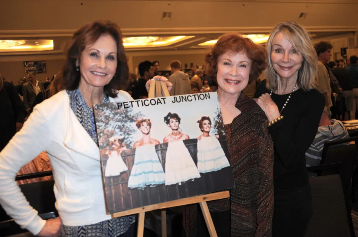 Actresses from Petticoat Junction pose with show poster