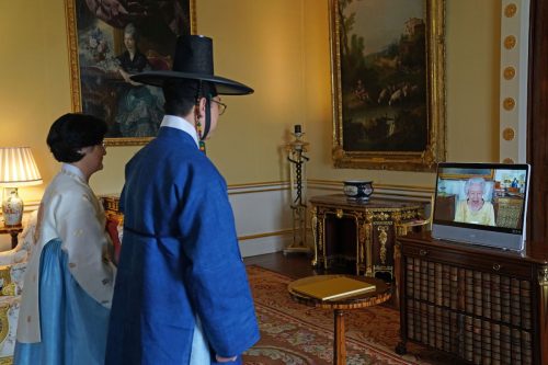 Queen Elizabeth meeting with the Ambassador from the Republic of Korea, Gunn Kim, and HeeJung Lee via video chat on October 26, 2021
