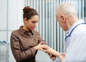 Woman showing doctor her arm