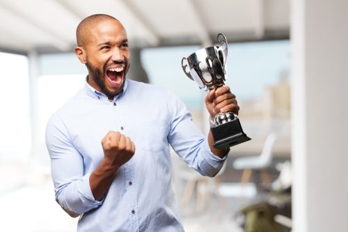 Man happy with trophy