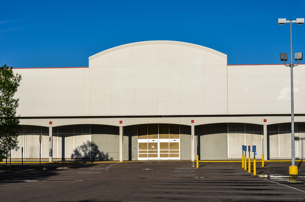 The exterior of a closed big box store