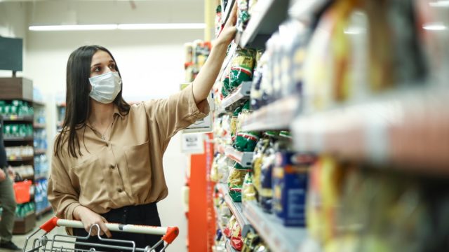 Woman Shopping At The New Normal, Supermarket With Corona Virus