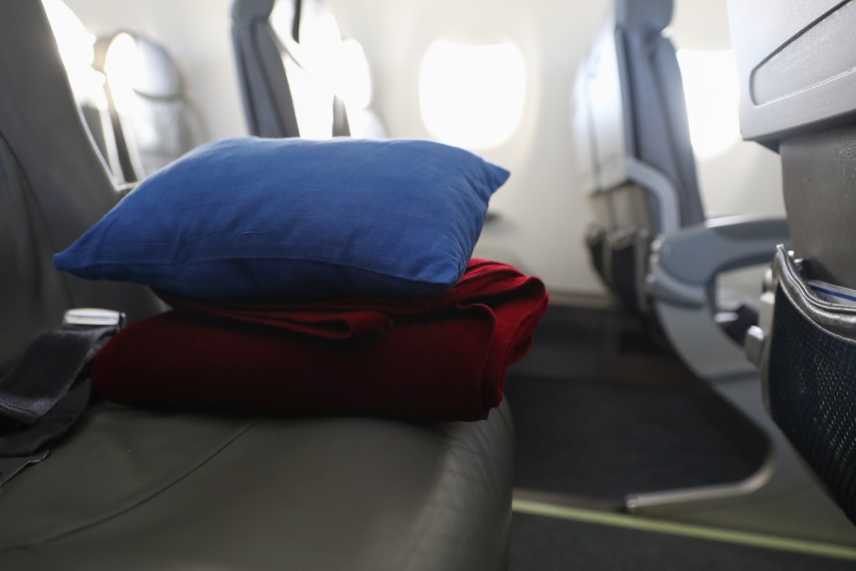 Never Use the Blankets and Pillows on a Plane — Best Life