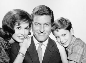 Mary Tyler Moore, Dick Van Dyke, and Larry Mathews in a black and white photo