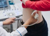 Doctor giving kidney ultrasound