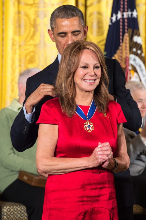 Marlowe Thomas receiving the Presidential Medal of Freedom from Barack Obama in 2014