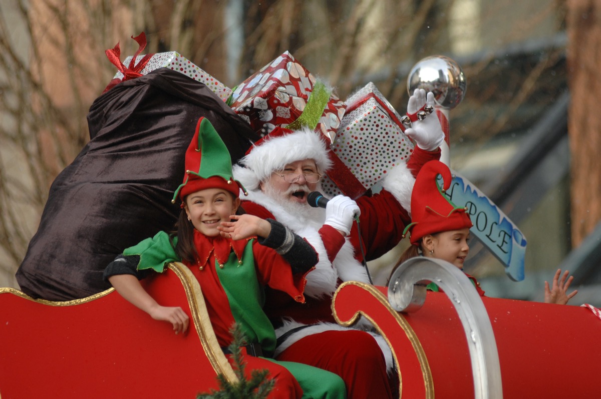 Santa Claus and elves in local parade