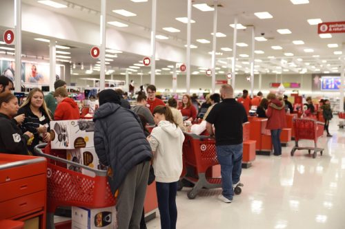Customers purchase discounted door busters at Target on Black Friday.