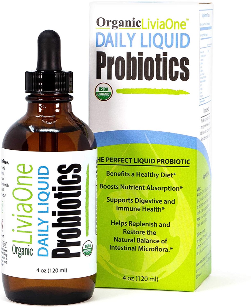 liviaone daily liquid probiotics in amber bottle next to white cardboard box