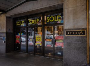 macy's storefront with closed signs