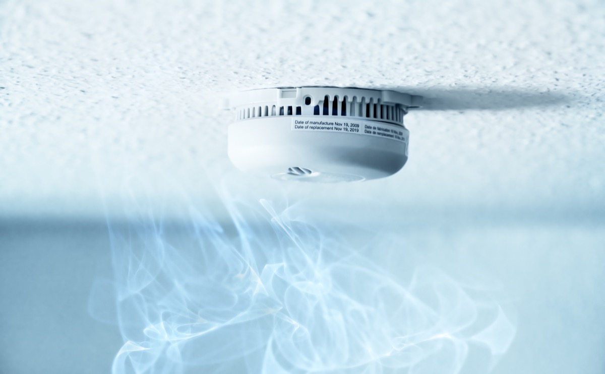 smoke detector surrounded by smoke