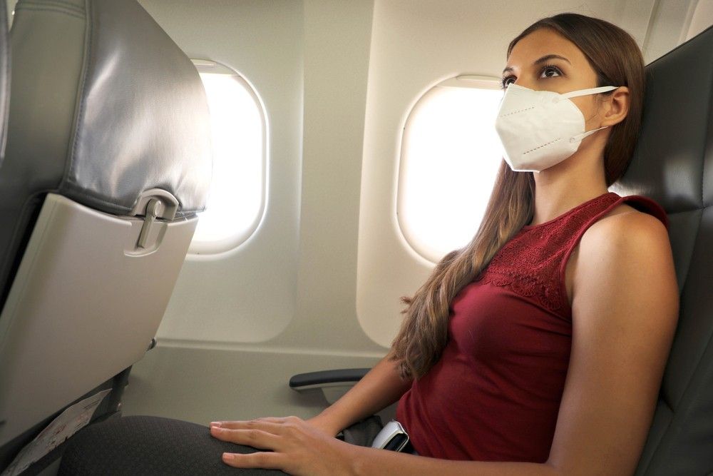 Never Take Medication On A Plane Without Trying It First Experts Warn   Young Woman On Plane Try Medication First 