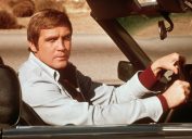 Lee Majors in a cart during a scene from "The Six Million Dollar Man" in 1975