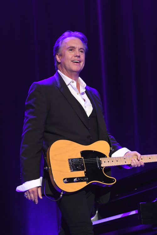Shaun Cassidy performing on stage in 2019