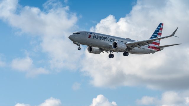 American Airlines airplane (Boeing 737 Max 8) landing at Miami International Airport.