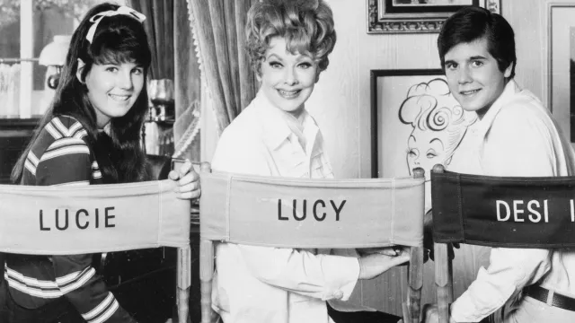 Lucie Arnaz, Lucille Ball, and Desi Arnaz Jr. on the set of "Here's Lucy" in 1968