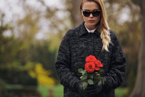 Fashionable woman at funeral