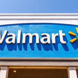 Close up of Walmart logo displayed on the facade of one of their supercenters in South San Francisco bay area
