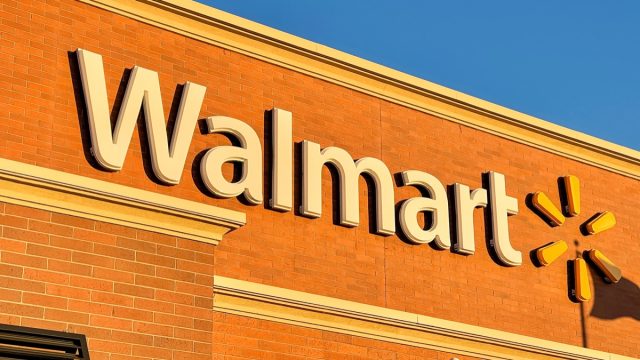 a walmart sign on a store exterior.