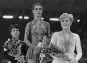 Kira Ivanova, Katarina Witt, and Rosalynn Sumners on the medal podium at the 1984 Winter Olympics