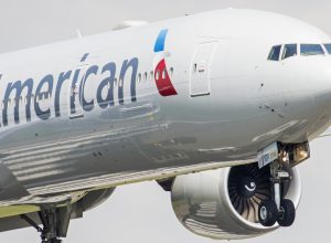An American Airlines plane landing at an airport