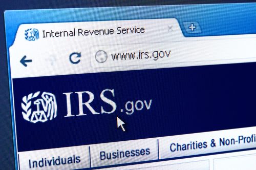 lose up of Internal Revenue Service (IRS) main page on the web browser. IRS is a United States government agency tasked with collecting yearly state and income tax from working residents and businesses.