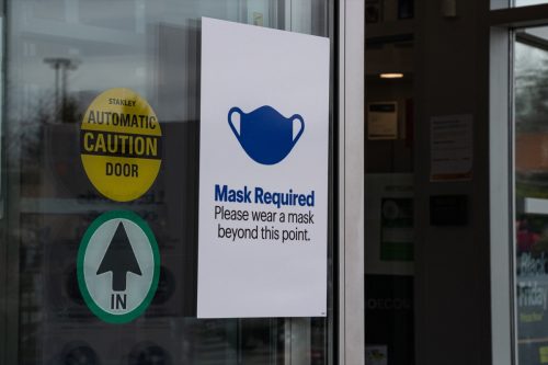 View of sign Mask Required at the entrance of Best Buy Store due to COVID-19 Prevention