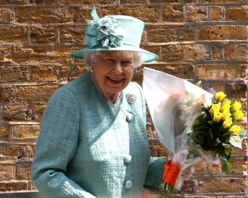 Queen Elizabeth visiting a replica of one of the original Sainsbury's in 2019