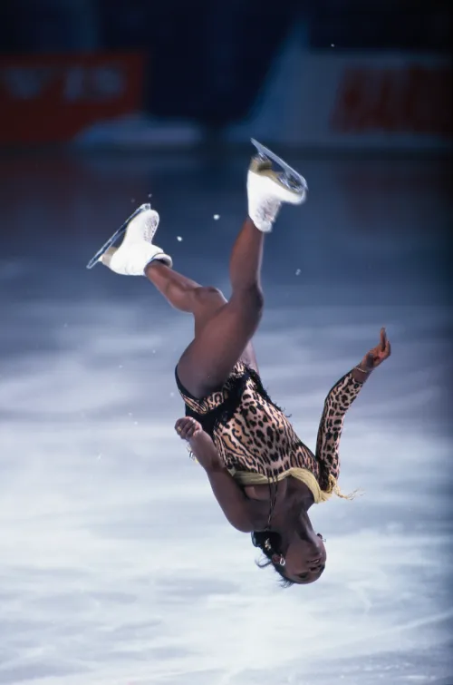 Surya Bonaly doing a backflip during the 1996 Miko Trophy