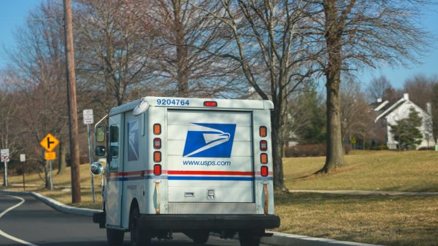United States Postal Service collection and delivery van on a residential complex