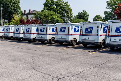 USPS Post Office Mail Trucks. The Post Office is Responsible for Providing Mail Delivery III