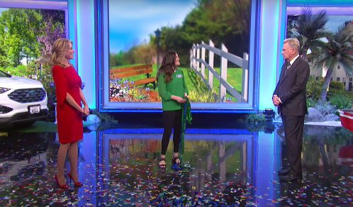 Vanna White, Lisa Kramer, and Pat Sajak, on the Feb. 7, 2022 episode of "Wheel of Fortune"