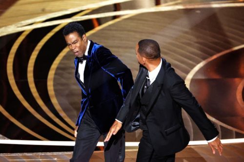 will smith strikes chris rock onstage at the academy awards