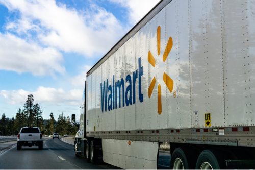 Walmart truck driving on the road