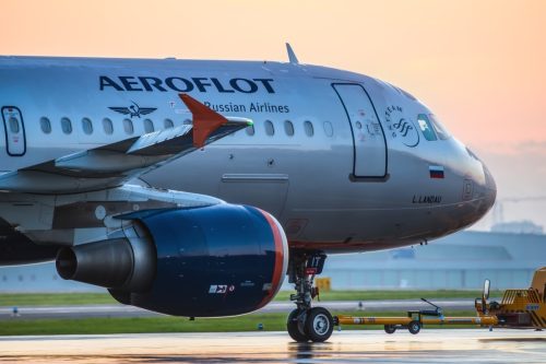 Airbus A320 Aeroflot taxiing to terminal at Sheremetyevo international airport at sunrise