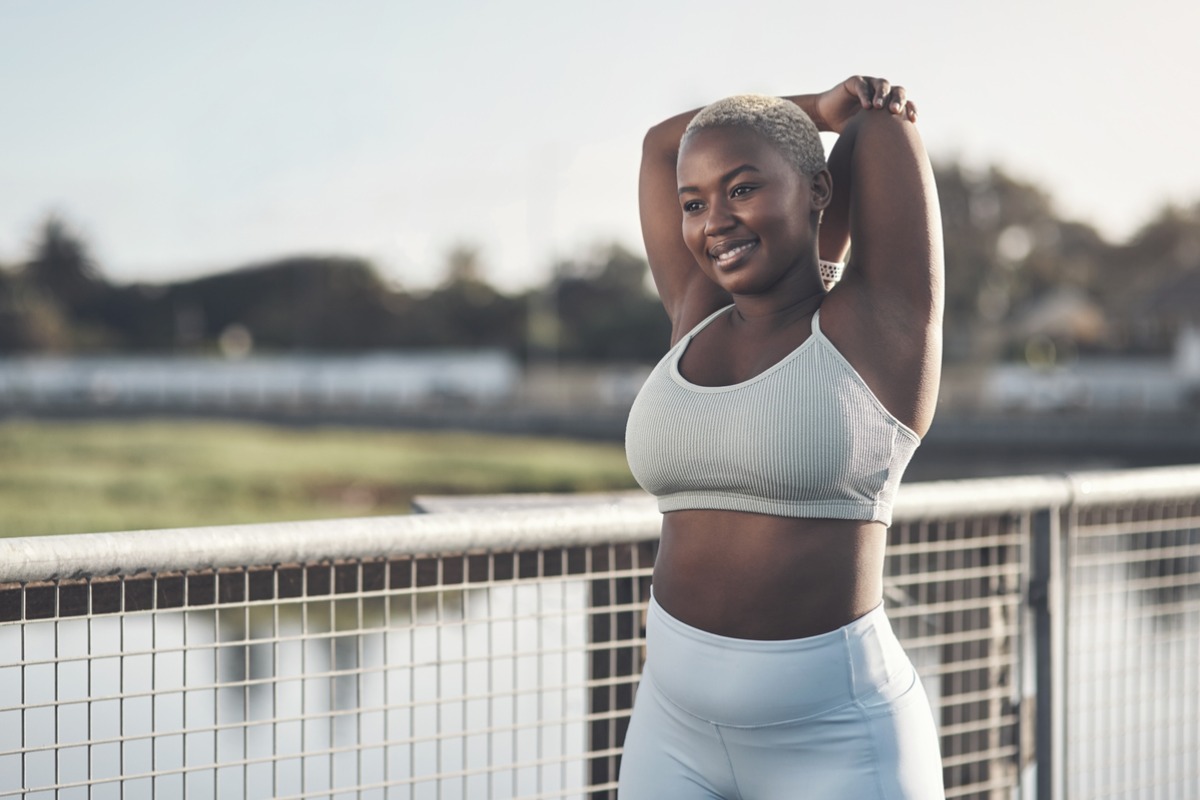 woman stretching outside