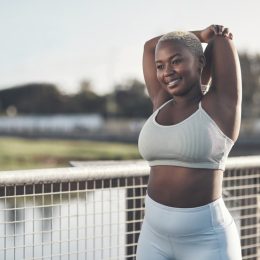 woman stretching outside