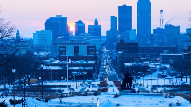 The skyline of Des Moines, Iowa at sunset in winter