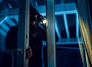 robber breaking into house