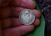 rare silver coin in hand