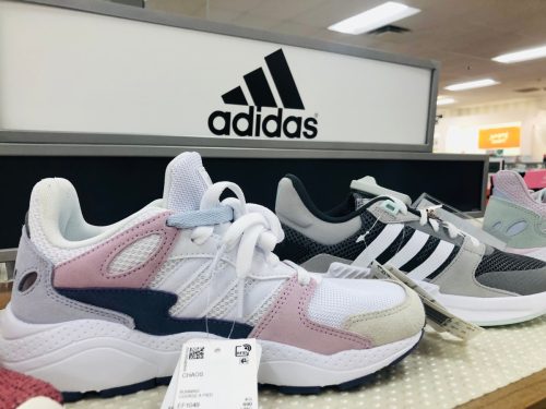 Colorful Adidas brand running shoes on display at Kohl's