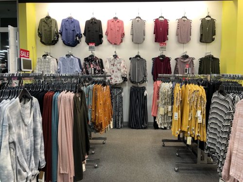 Blouses and shirts at Kohl's clothing store, women's section.
