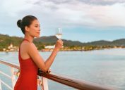 woman drinking champagne on a cruise