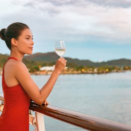 woman drinking champagne on a cruise