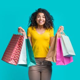 woman holding shopping bags
