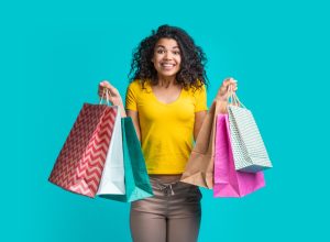 woman holding shopping bags