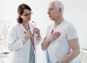 female doctor consulting male patient on heart concern