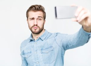 man taking selfie